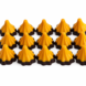 Bell-shaped chocolates on white backdrop