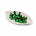 Green candies in a leaf dish