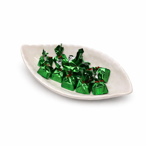Green candies in a leaf dish Green candies in a leaf dish