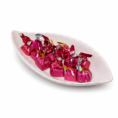 Pink candies in a leaf dish